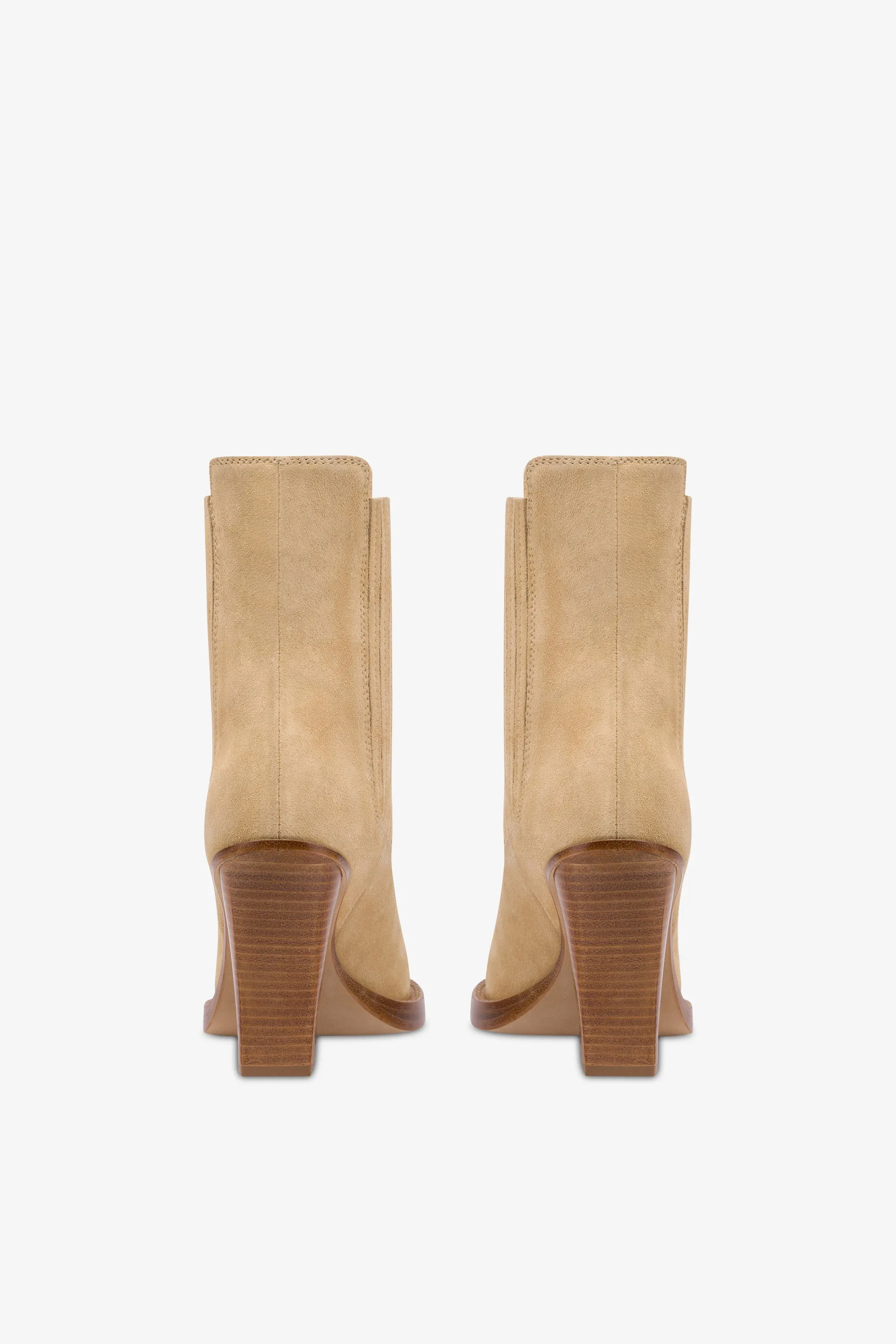 Boots in ecru suede leather